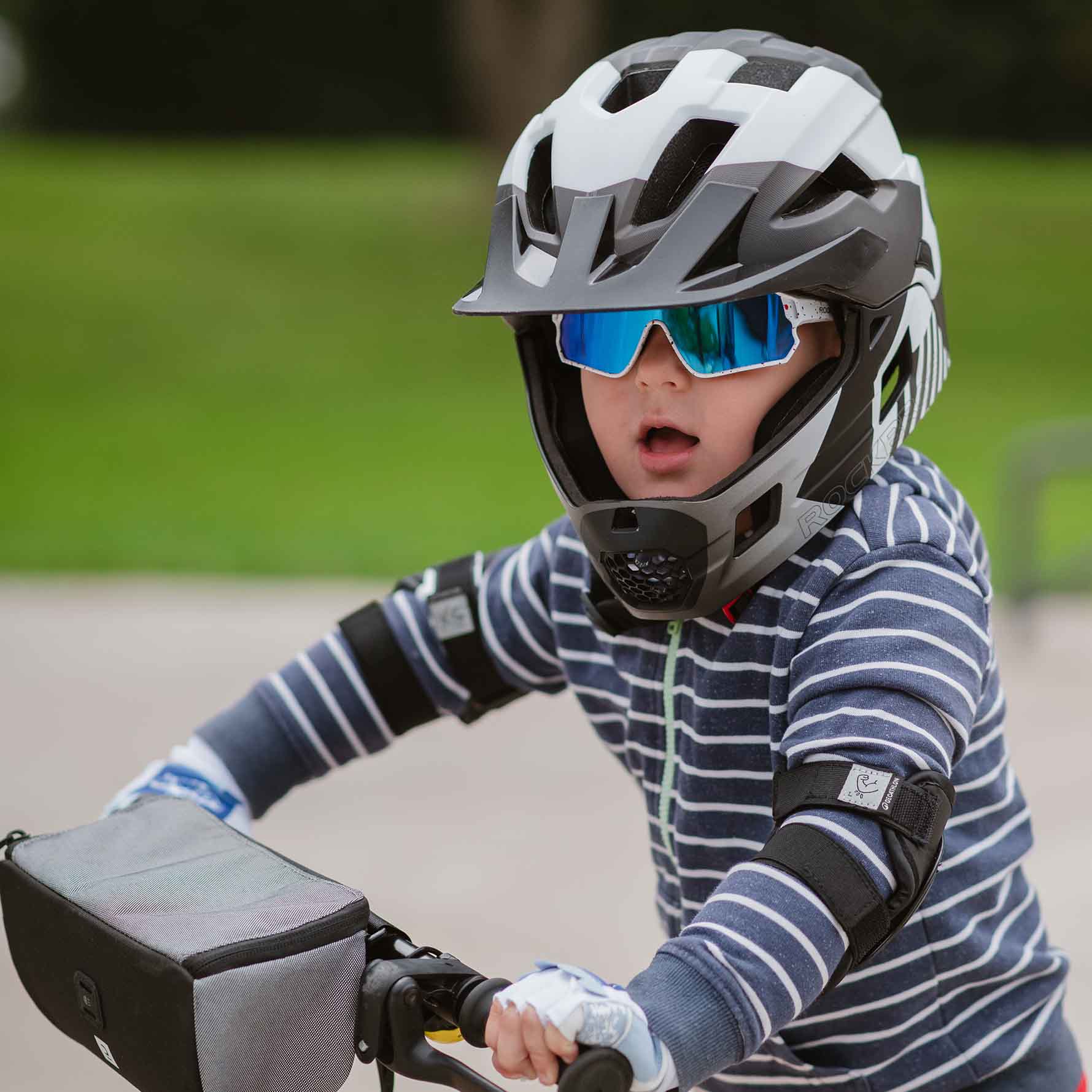 Child wearing ROCKBROS cycling gear for biking adventures