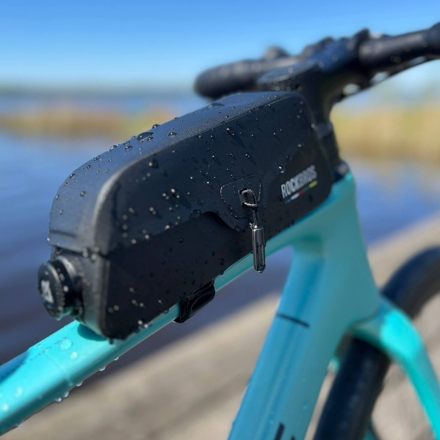 ROCKBROS magnetic waterproof top tube bike frame bag displayed on road bike