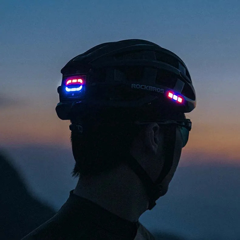 Cyclist using helmet with light for visibility in traffic, moving headlight direction, safer intersections