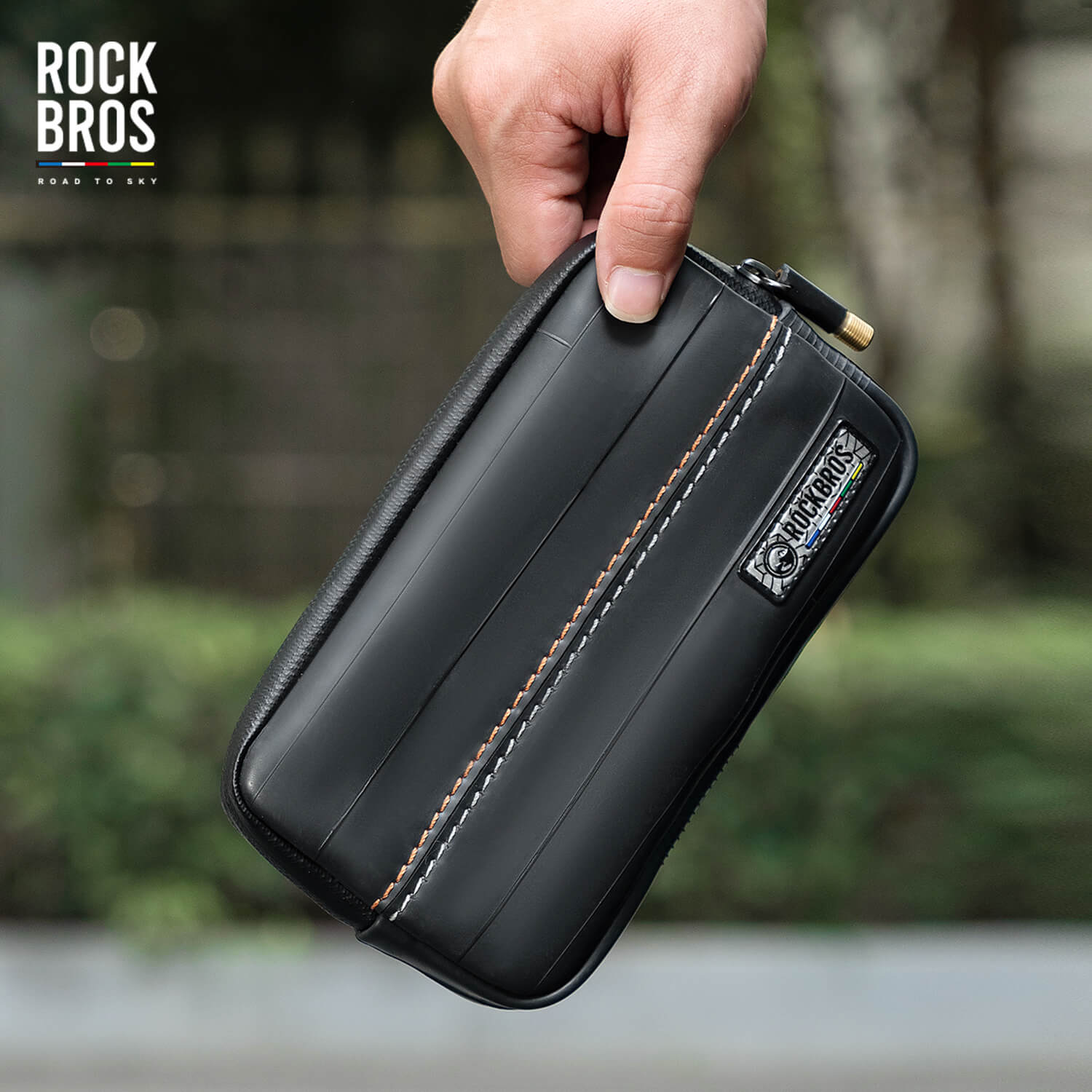Eco-friendly ROAD TO SKY cycling wallet made from recycled tire rubber and Tyvek®