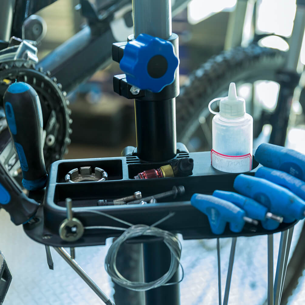 ROCKBROS bike repair stand tool tray with organized slots for bicycle maintenance tools