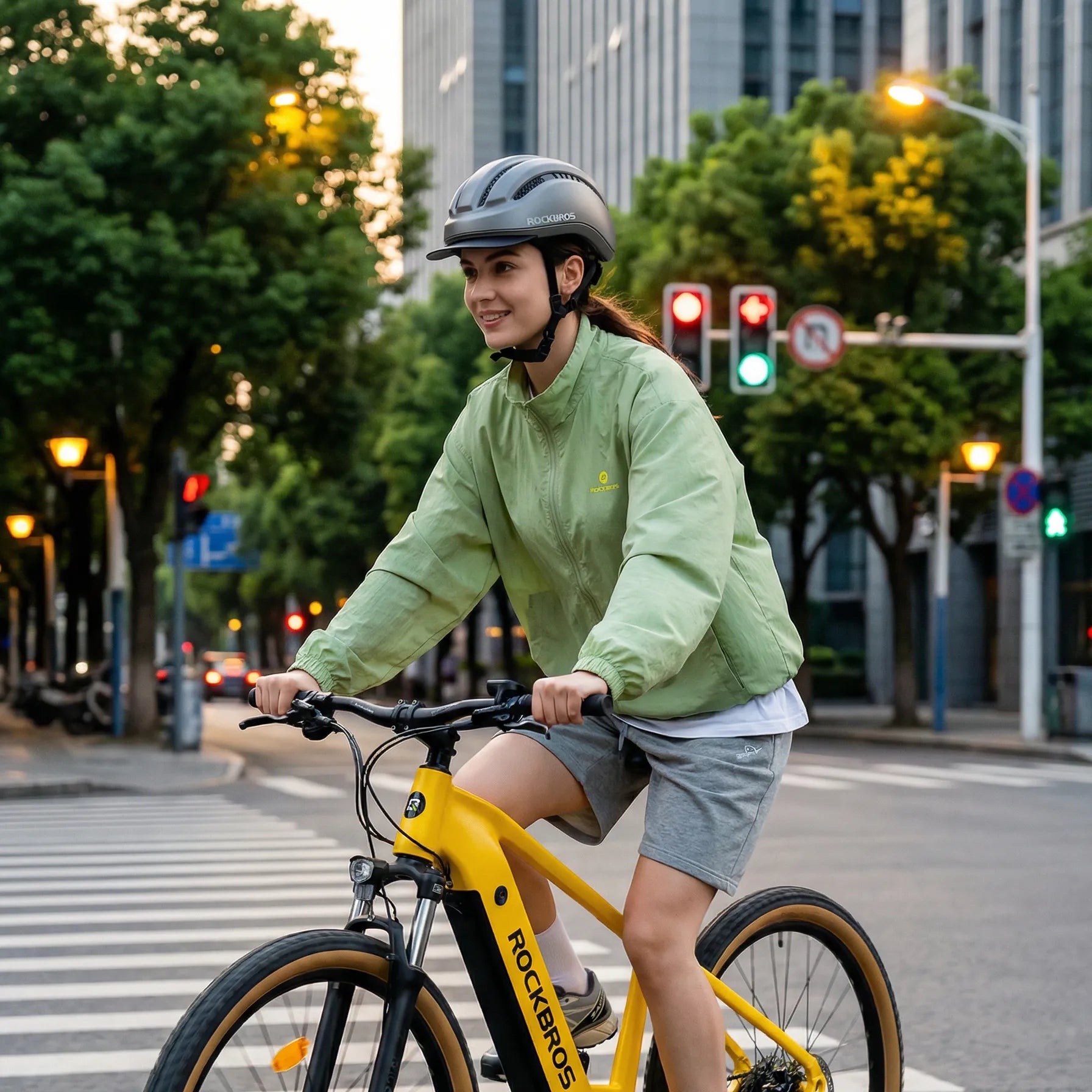 ROCKBROS e-bike safety accessories including a bike helmet, lights, and mirror for safer riding