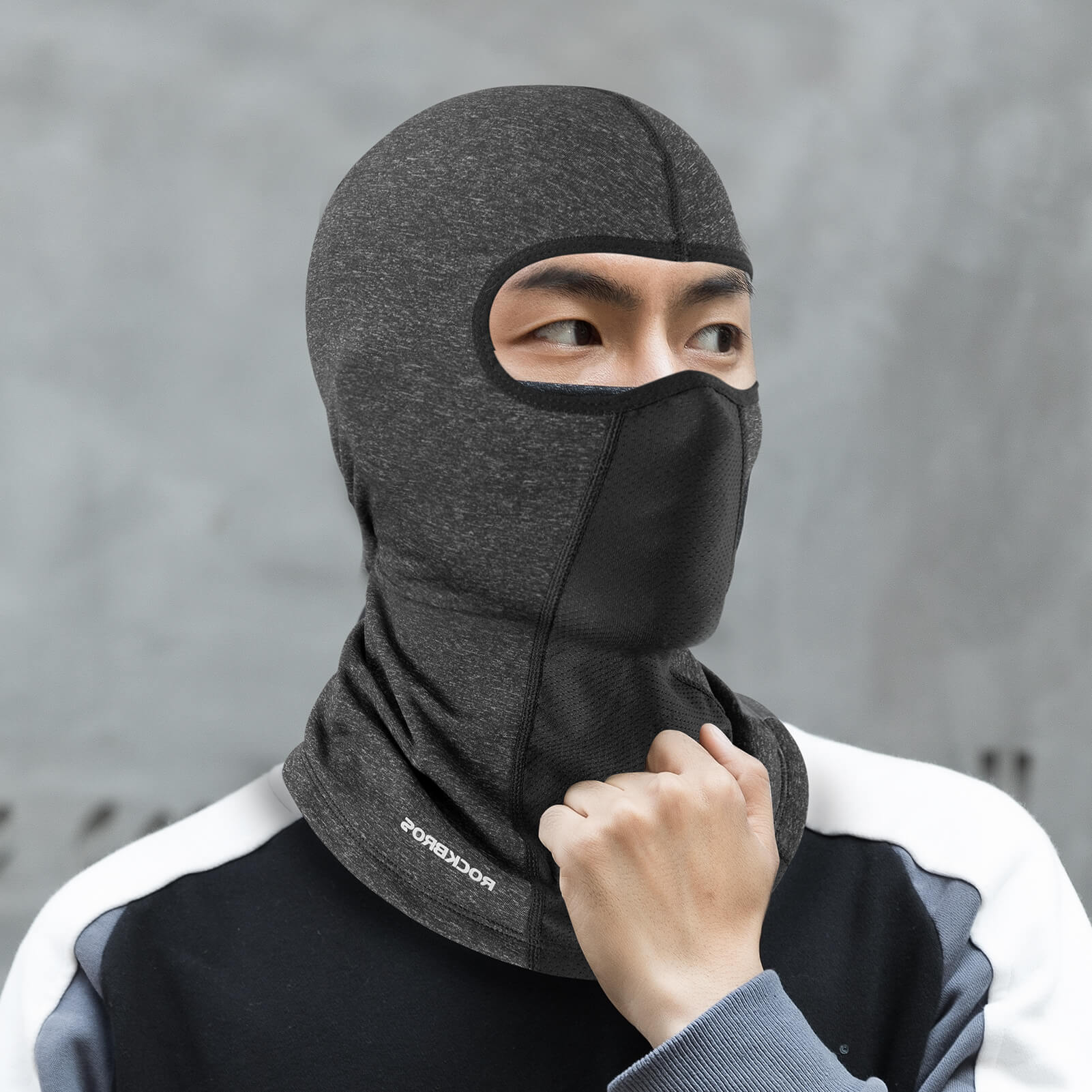 Cyclist wearing ROCKBROS fleece balaclava with full face and neck protection for winter rides