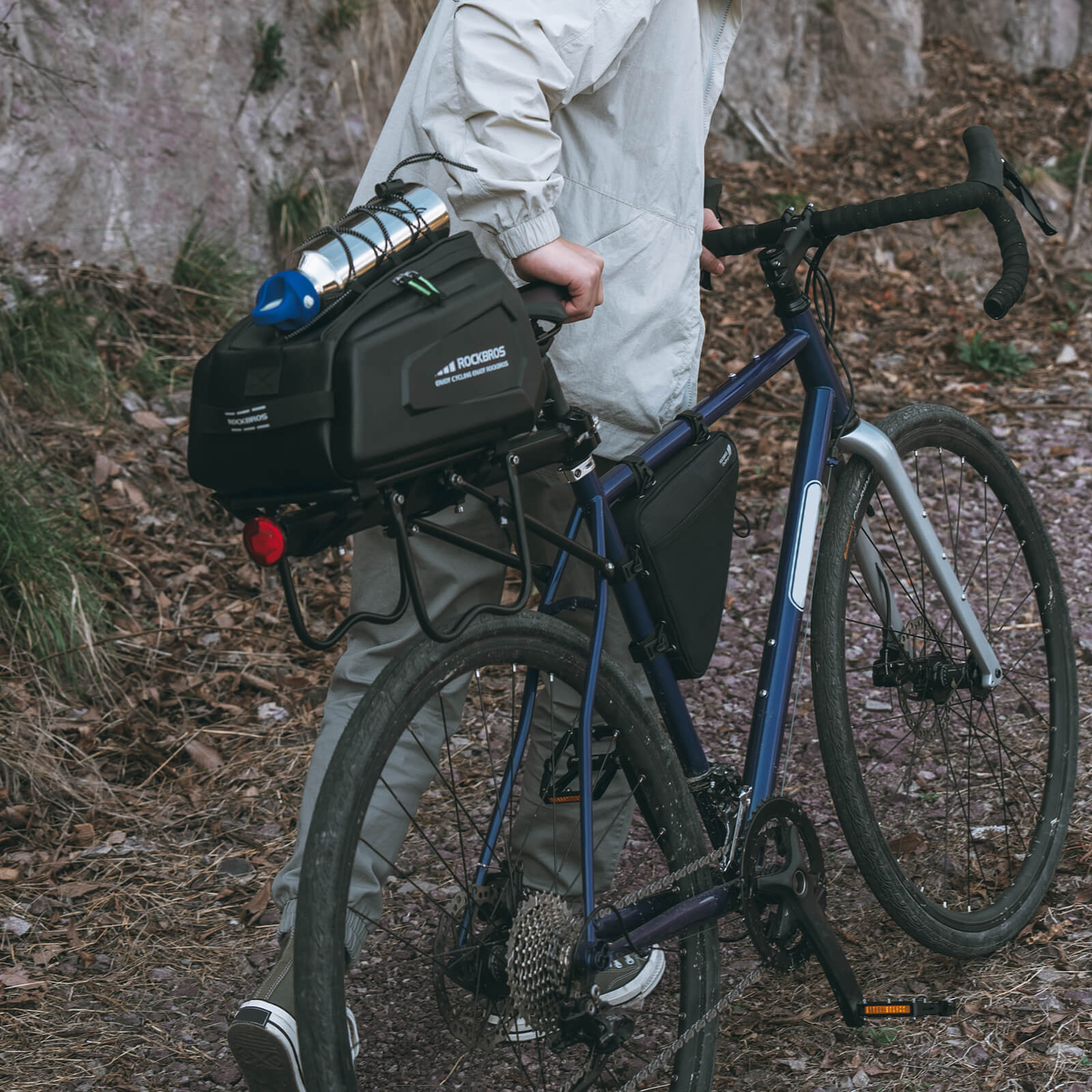 ROCKBROS hard shell bike trunk bag 9L mounted on rear rack for commuting and touring.