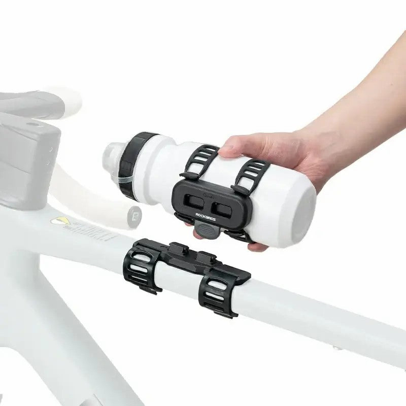 ROCKBROS magnetic bike bottle holder with strap and magnetic mount design for secure cycling hydration.