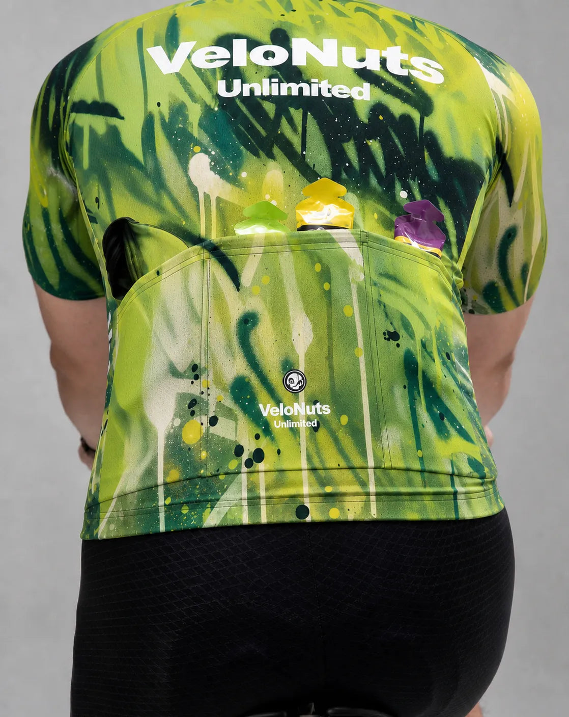 VeloNuts cycling jersey featuring three rear pockets for storing phone, snacks, and cycling essentials