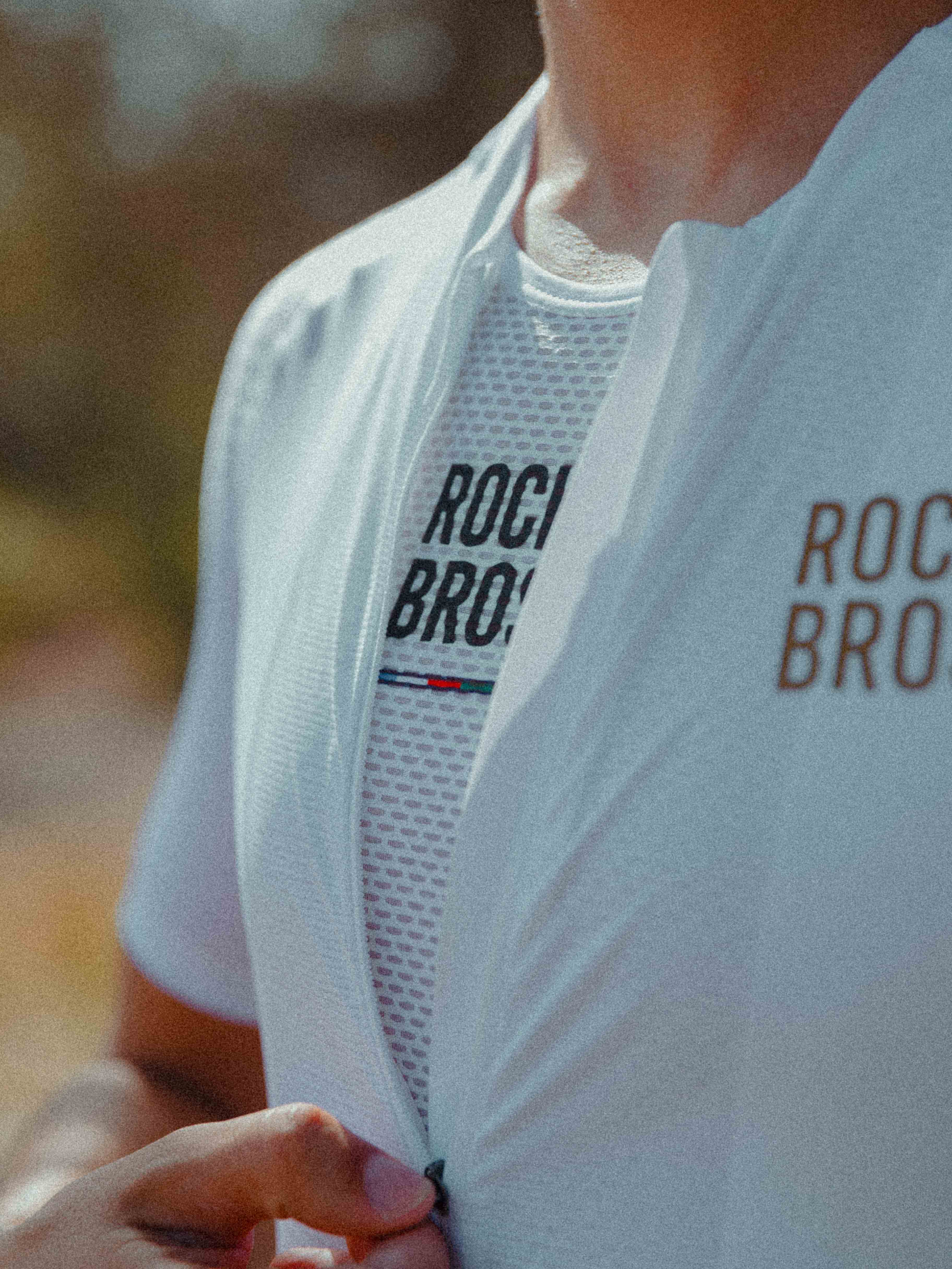 Professional moisture-wicking long sleeve cycling jersey with ergonomic fit and triple rear pockets.