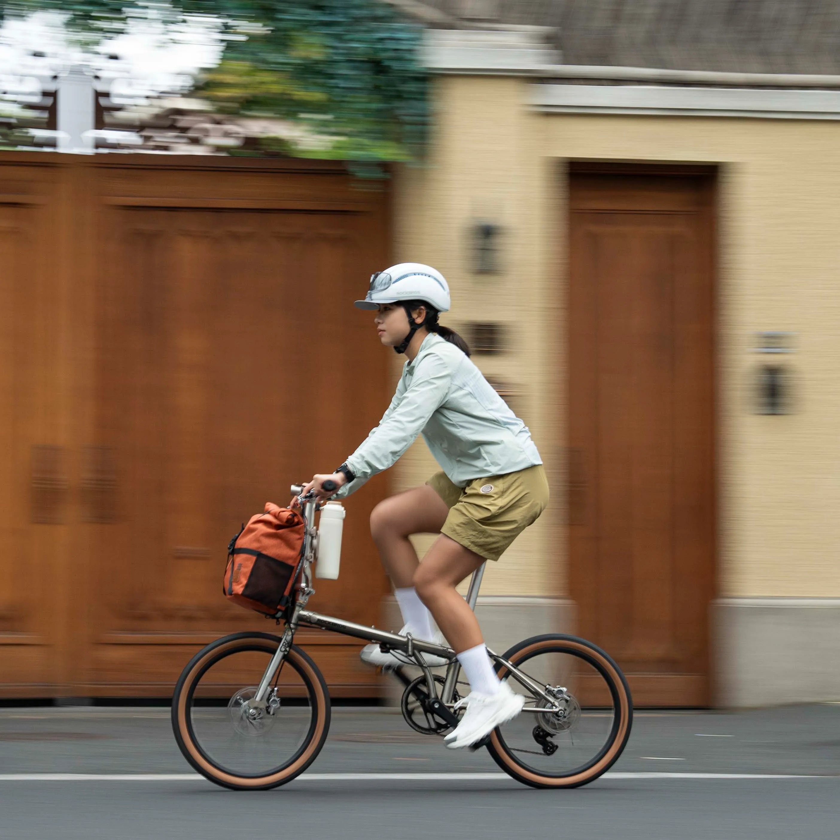 Cyclist commuting through the city with essential cycling gear for daily rides