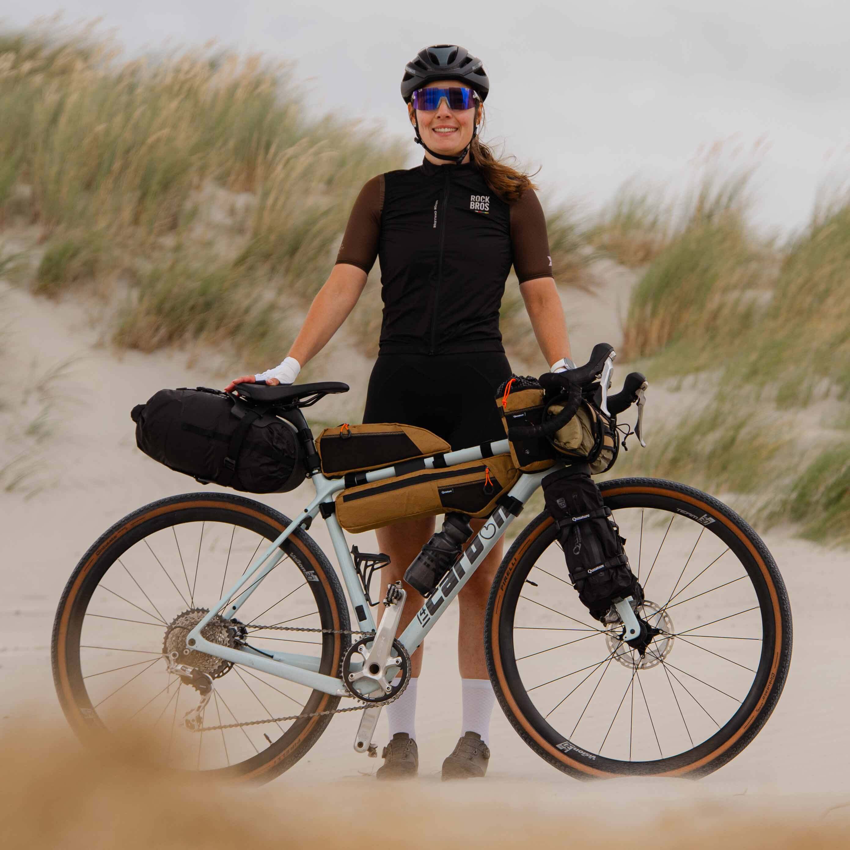 QUNATURE bikepacking collection featuring durable handlebar bag supports and cycling bags.