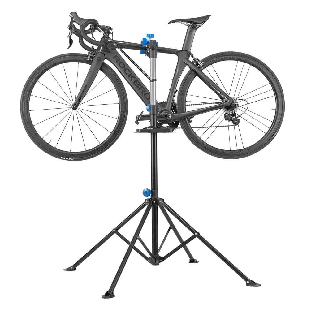 ROCKBROS adjustable telescopic bike repair stand with 360-degree rotating clamp, height adjustment, and foldable four-leg base for bicycle maintenance