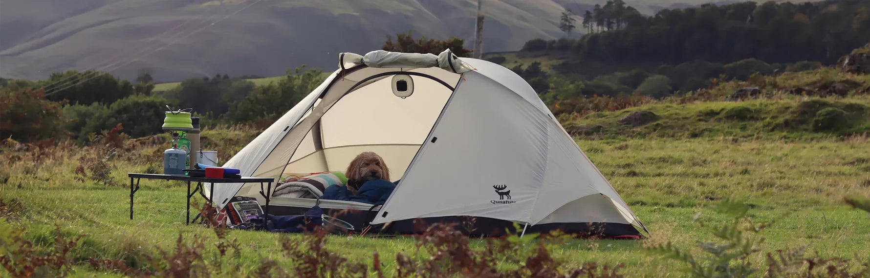 Cyclist enjoying a weekend camping adventure during a long-distance bike ride