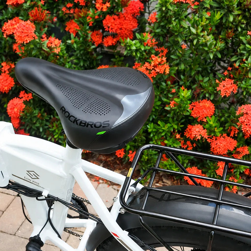 ROCKBROS e-bike comfort accessories including a bike saddle, pedals, and ergonomic riding gear