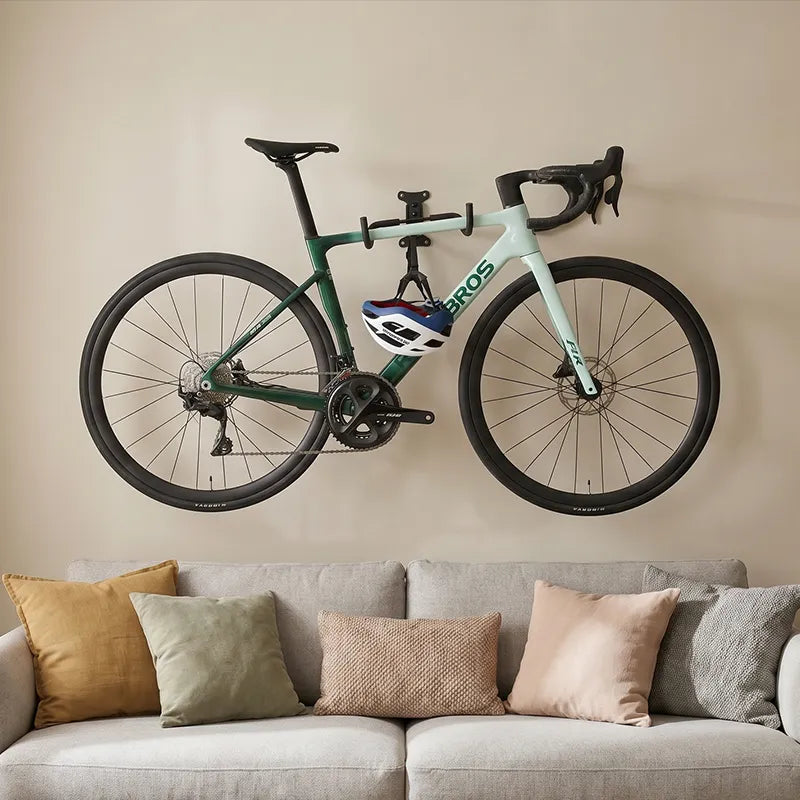 ROCKBROS foldable bike wall rack folded flat against the wall to save storage space