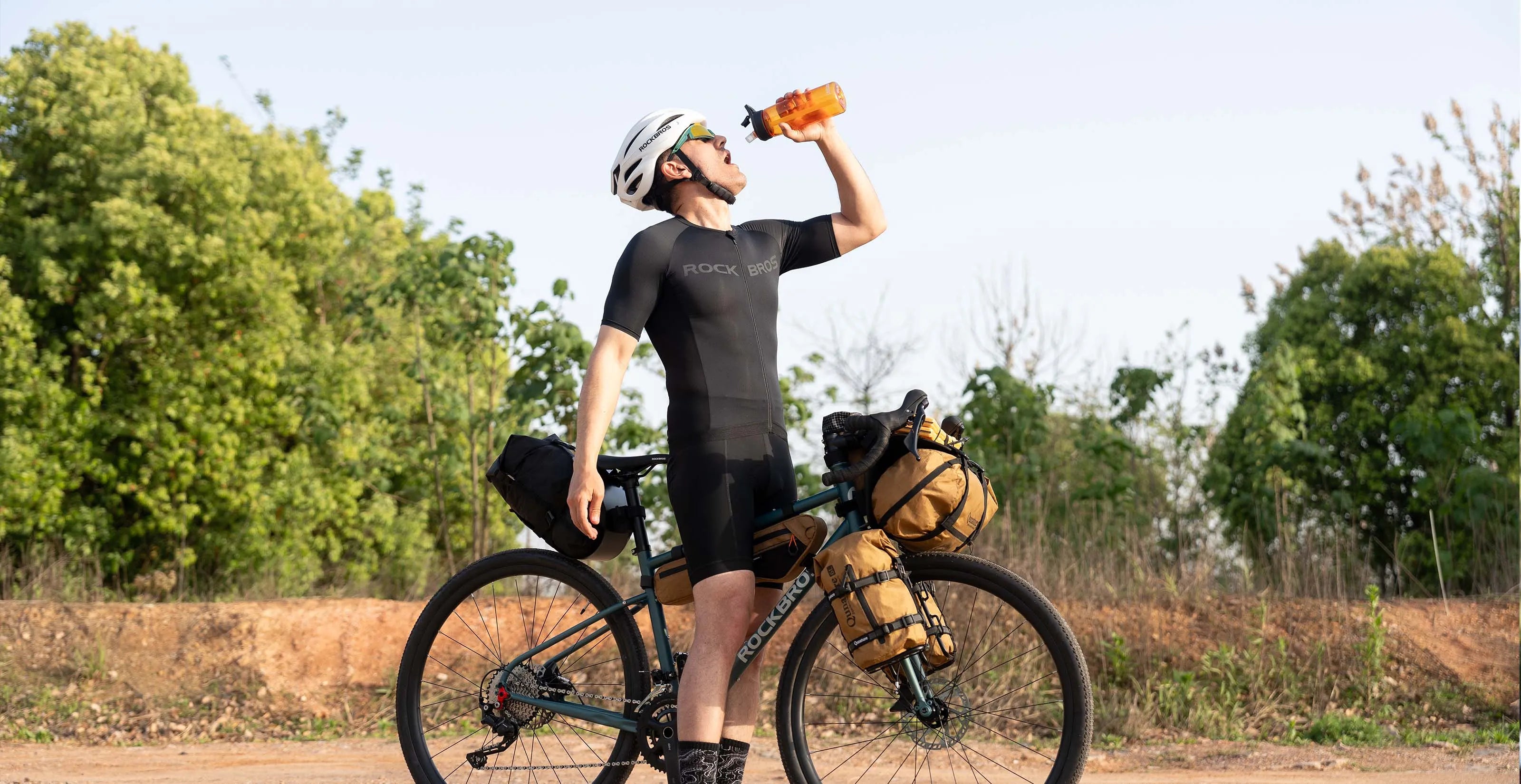 ROCKBROS gravel rider exploring mixed terrain with a fully equipped gravel bike on an outdoor adventure