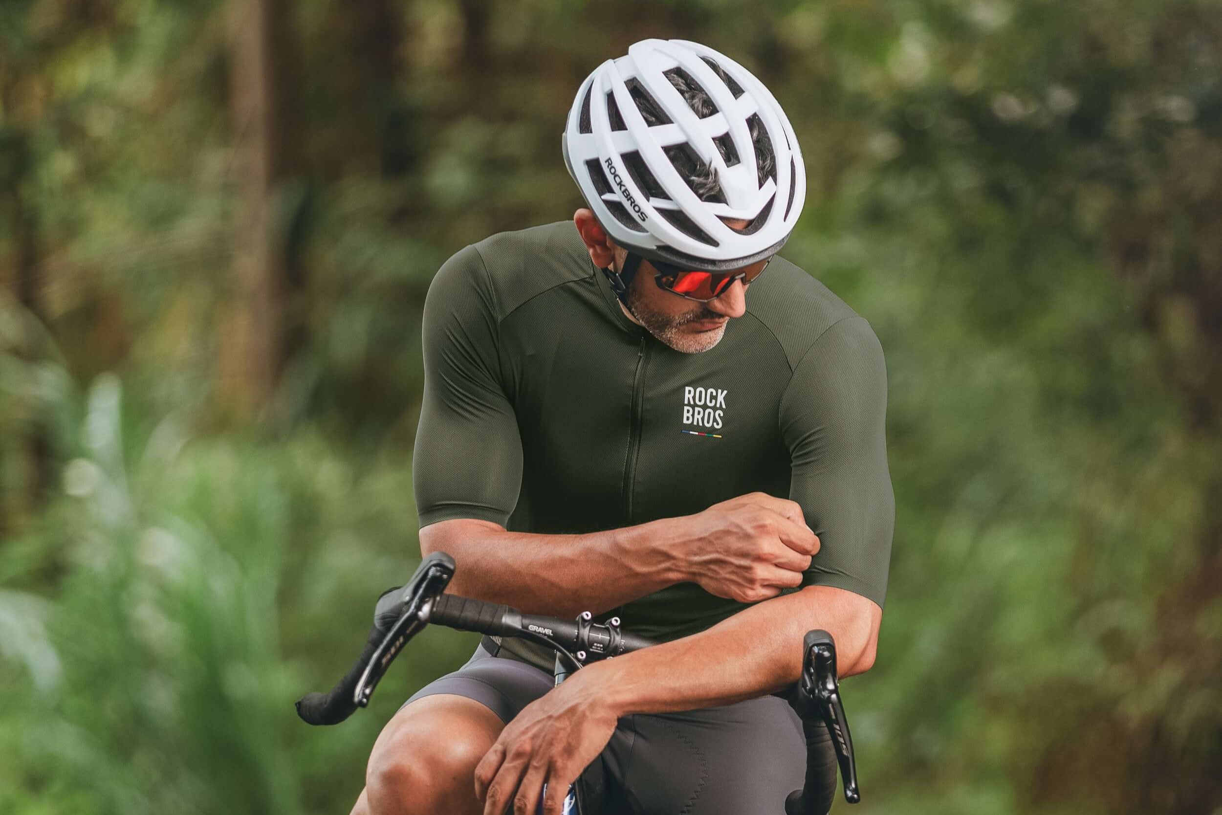 Male cyclist wearing RockBros ROAD-TO-SKY short sleeve jersey on road