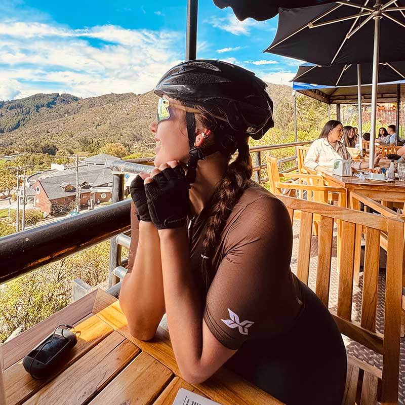 Female cyclist wearing ROCKBROS women’s short sleeve cycling jersey during a ride